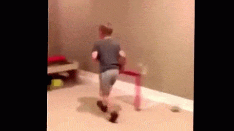 kid gets hit with basketball hoop dunk fail animated gif