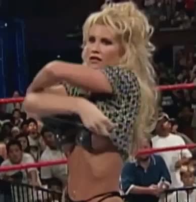 WWE/WWF Sable stripping in ring.