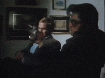 Kurt Russell as Elvis shoots out a TV screen animated gif